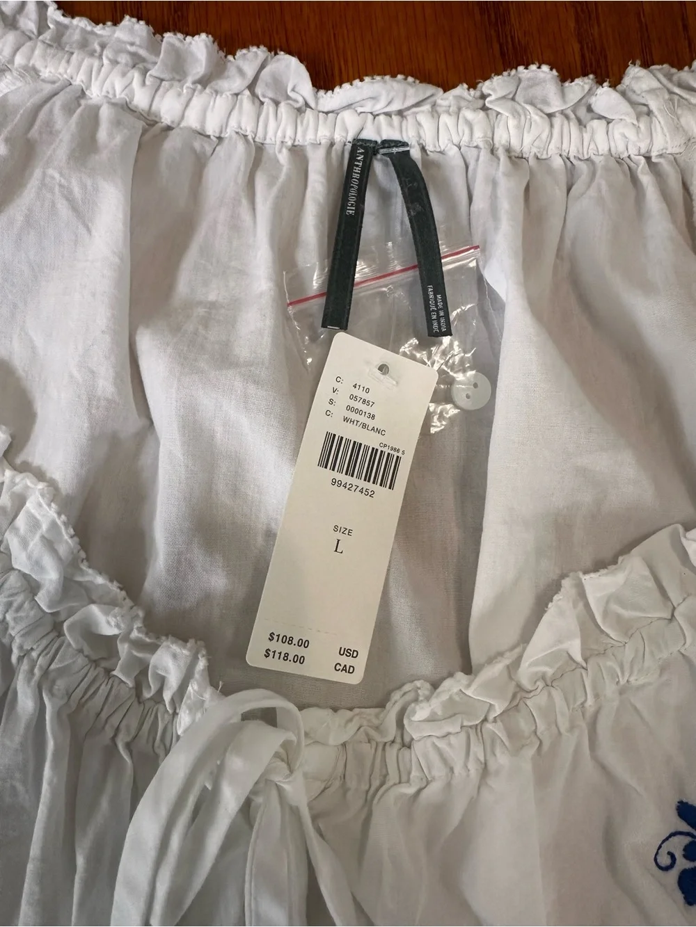 White Embroidered Peasant Top with Blue Floral Detailing